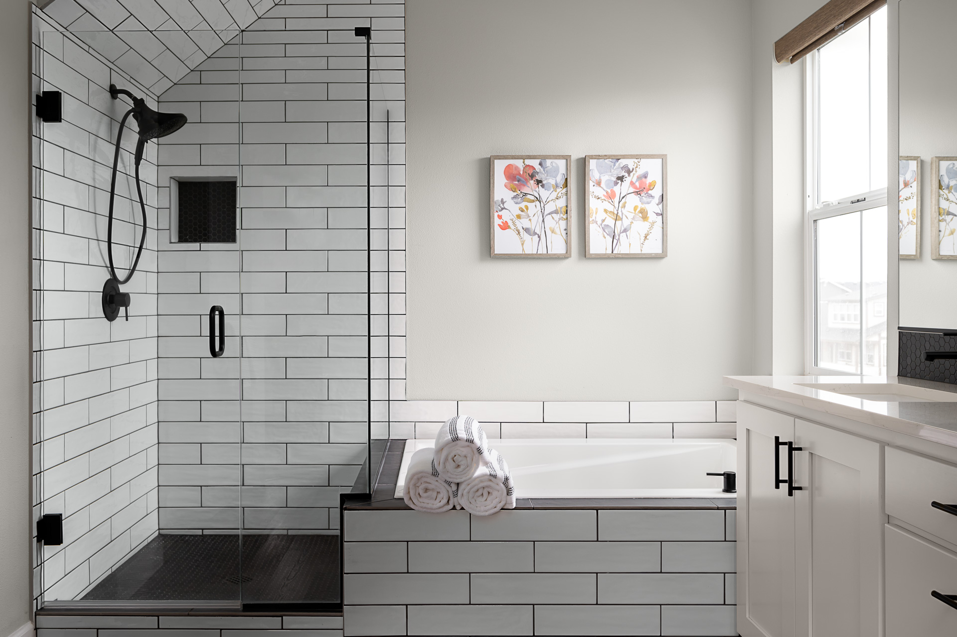 Modern bathtub and shower.