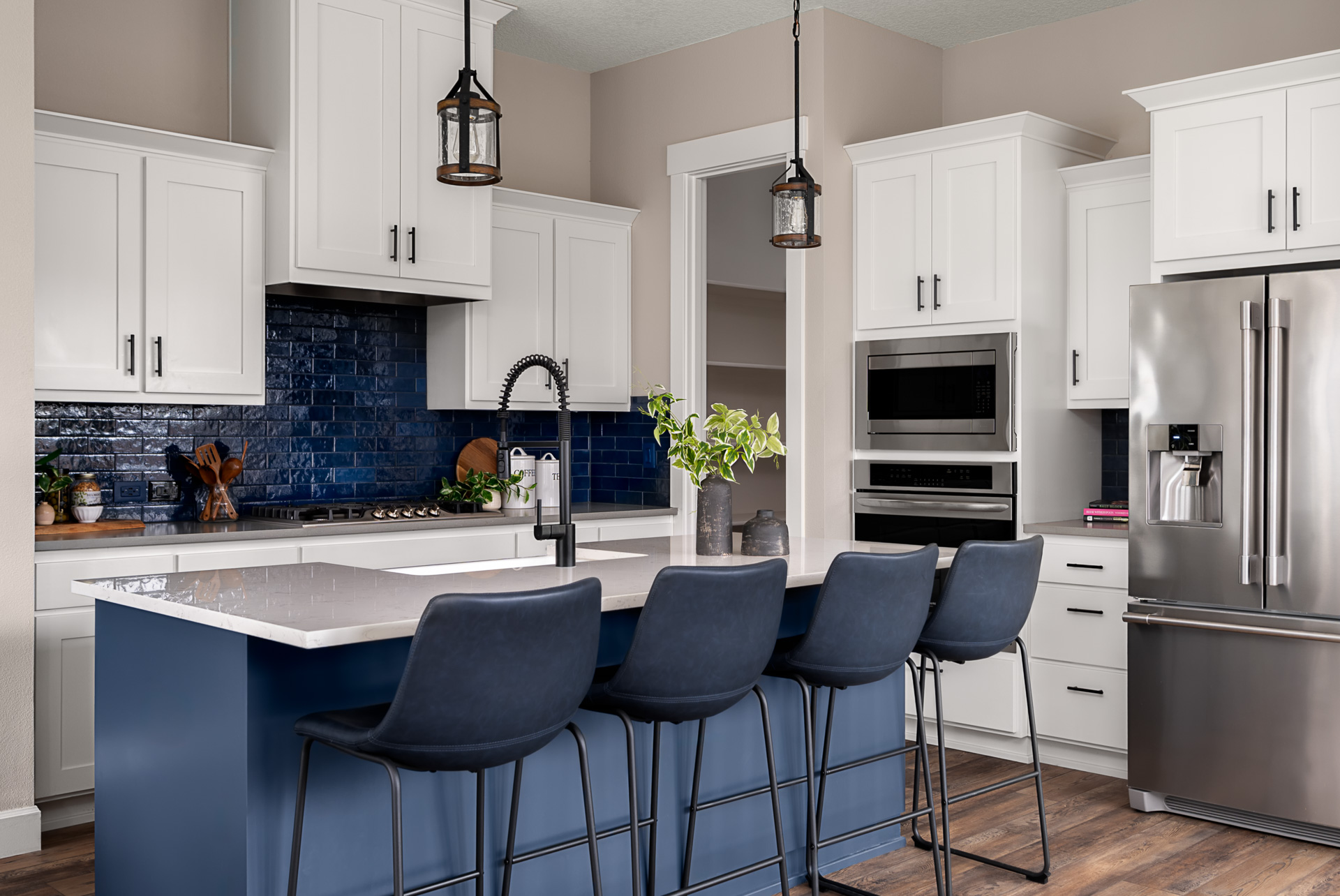 Modern kitchen with blue accenting.