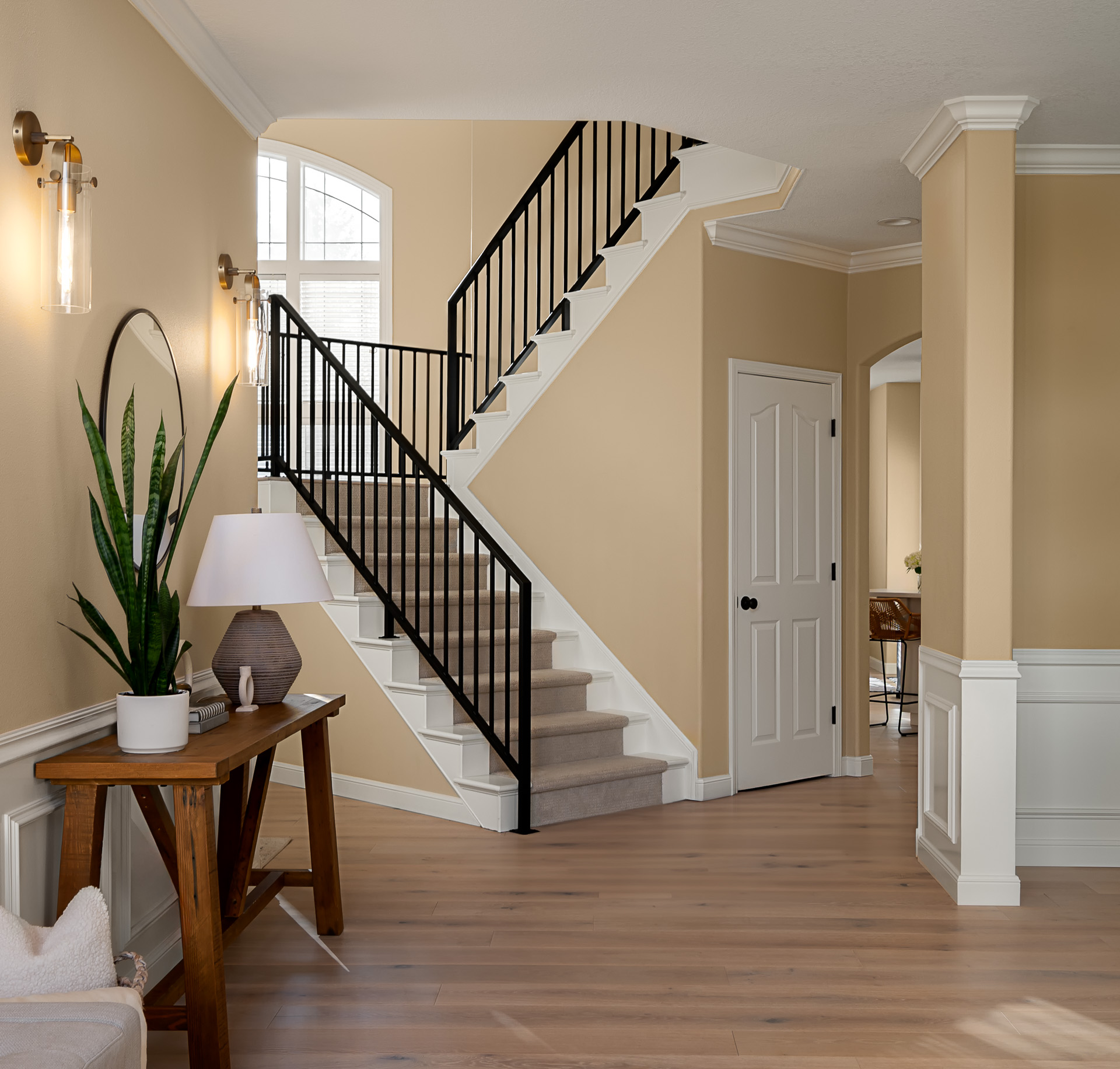Bright entry foyer and staircase.